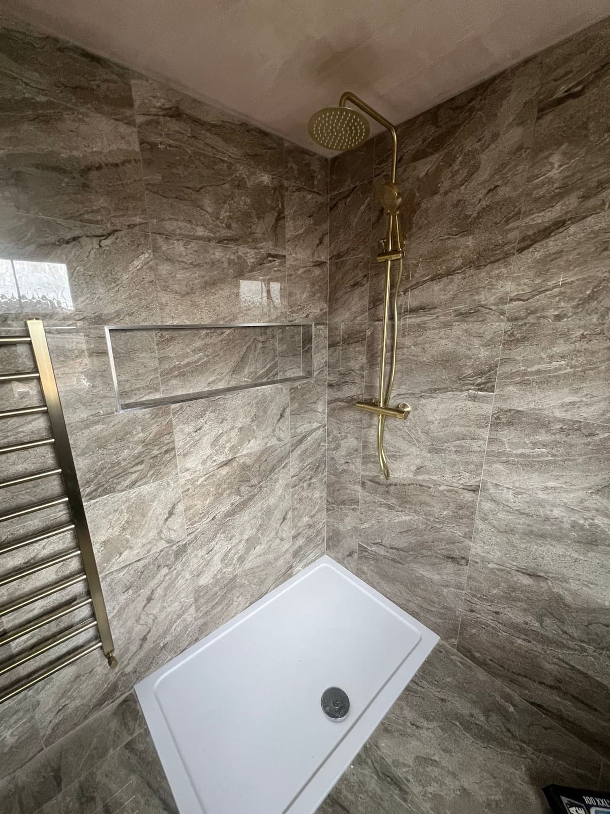 Rainfall shower, brushed gold fittings